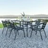Emma And Oliver 7 Piece Patio Table & Chairs Set With 31.5"x55" Rectangular Metal Table With Tempered Glass Top And 6 Black Aluminum Stacking Chairs
